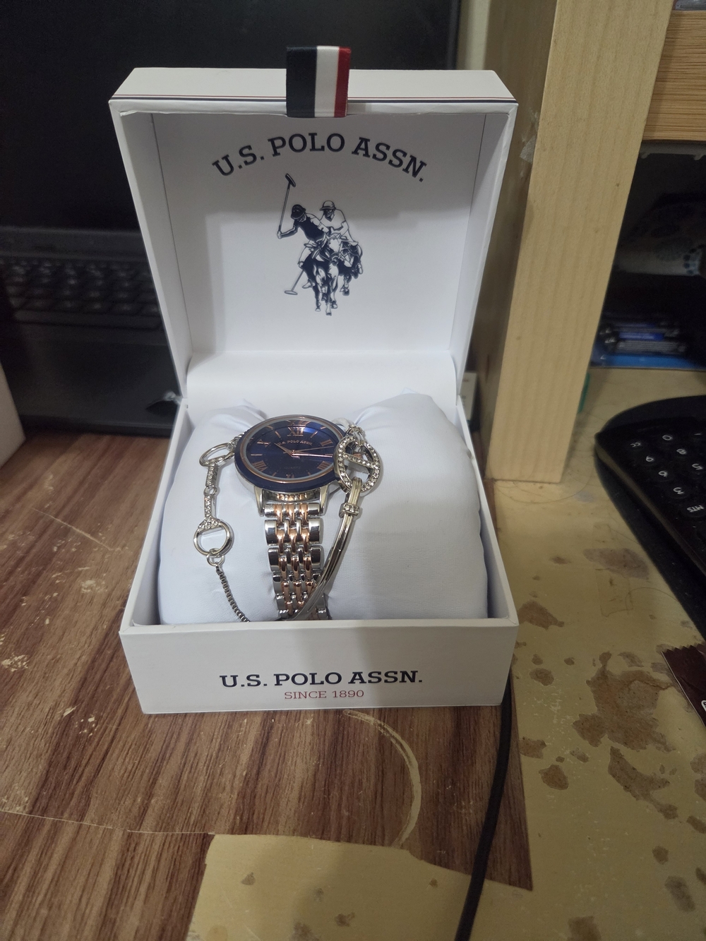 U.S. Polo Assn. Rose Gold and Navy Women's Watch And  Bracelets